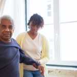 caregiver with old men